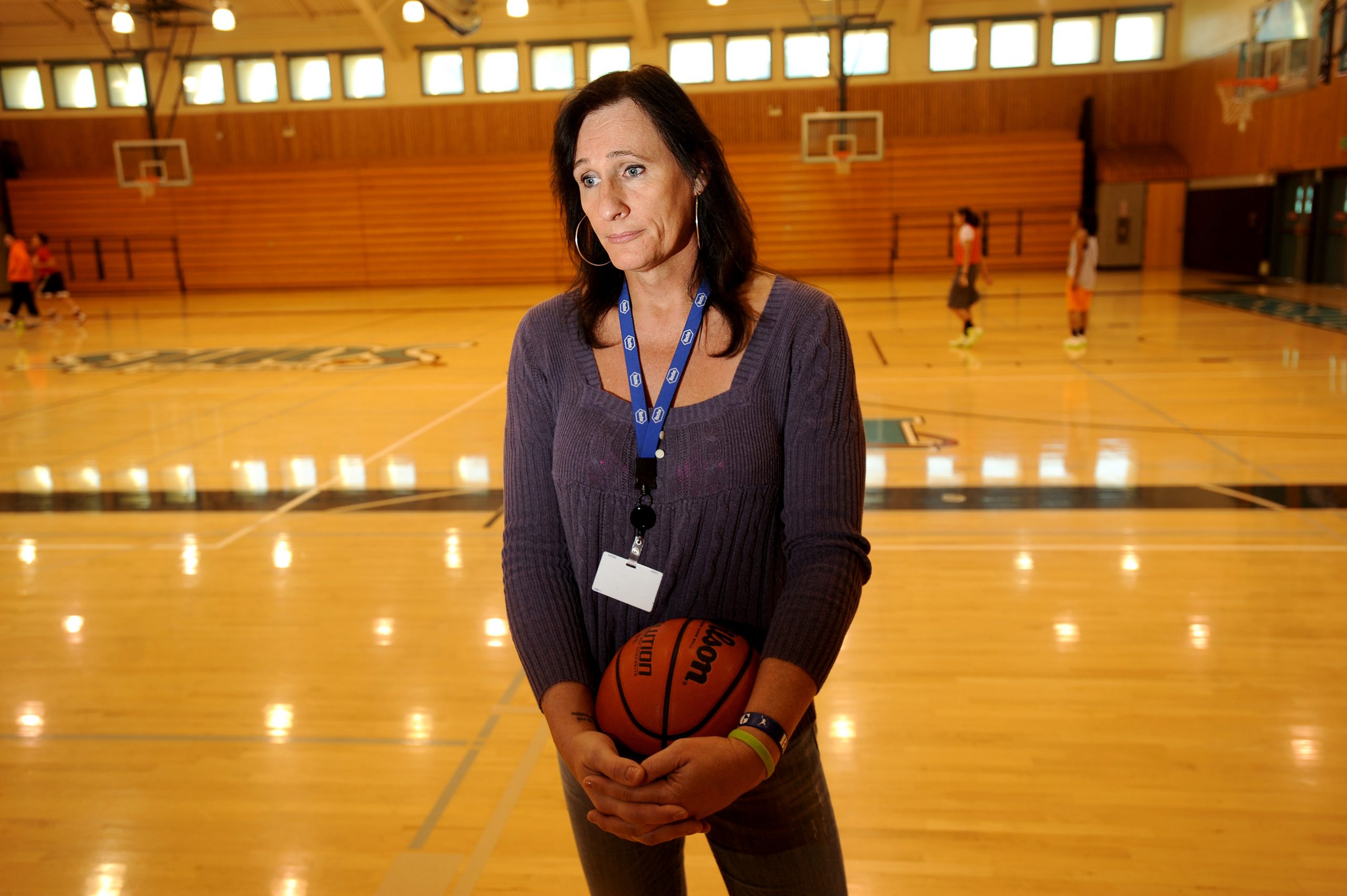 Transgender college hoops player keeps head high
