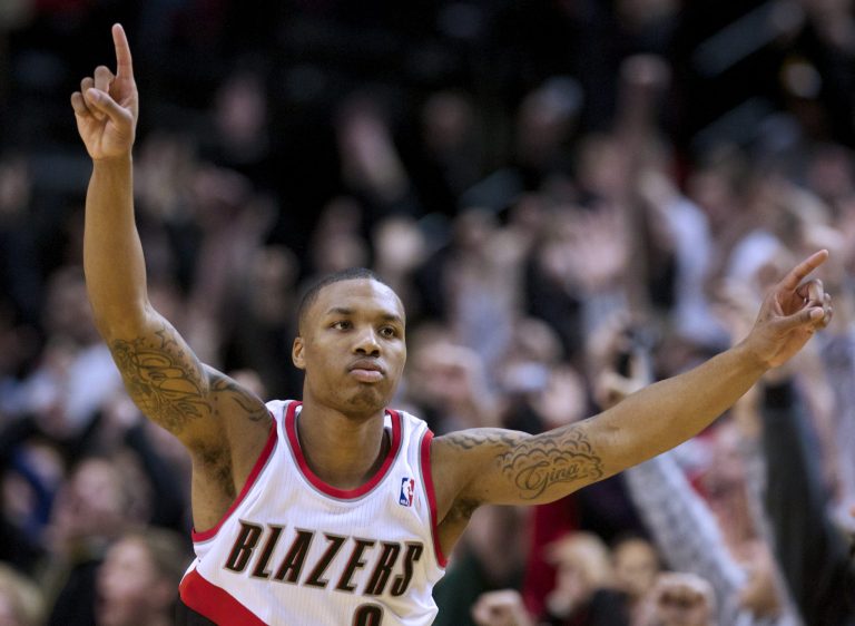   Portland Trail Blazers guard Damian Lillard (0) reacts after hitting the game-winning shot during an NBA basketball game against the New Orleans Hornets in Portland, Ore., Sunday, Dec. 16, 2012. The Trail Blazers defeated the Hornets 95-94. (AP Photo/The Oregonian, Bruce Ely)  