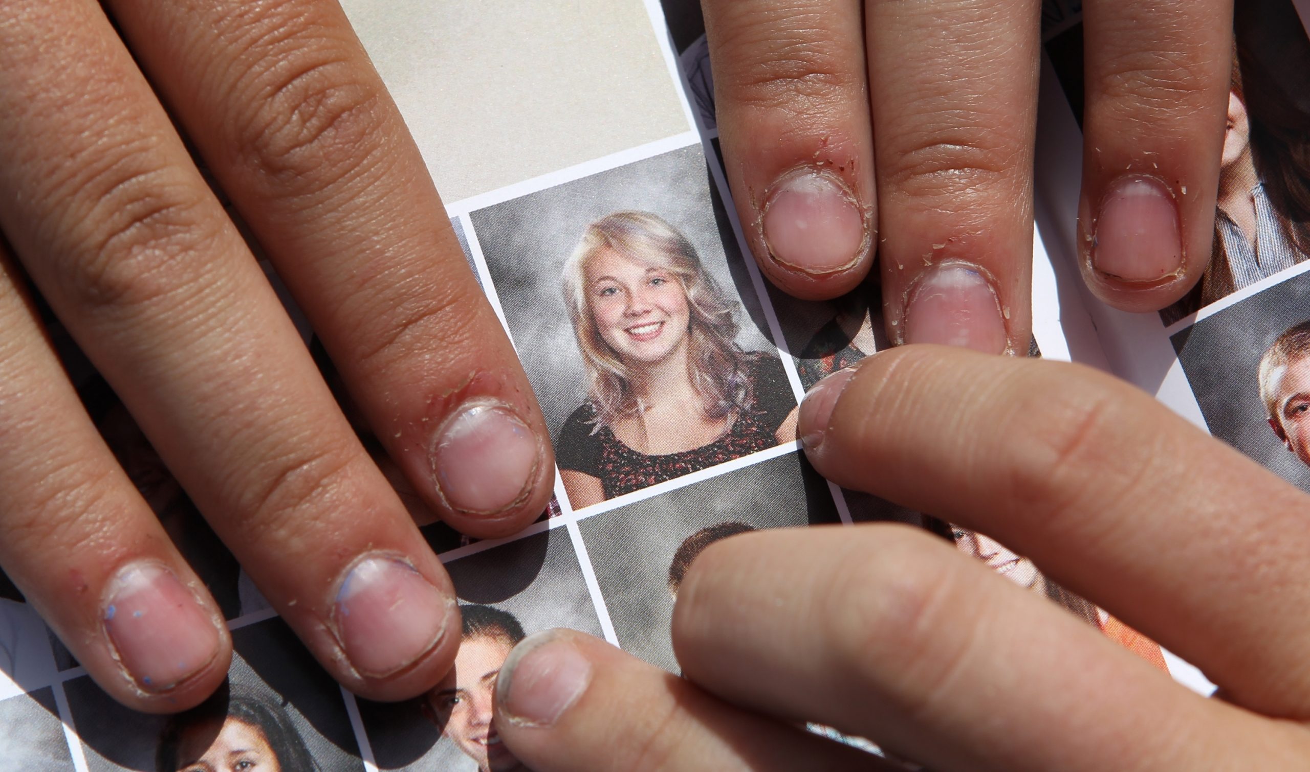 School apologizes to some teens for editing photos