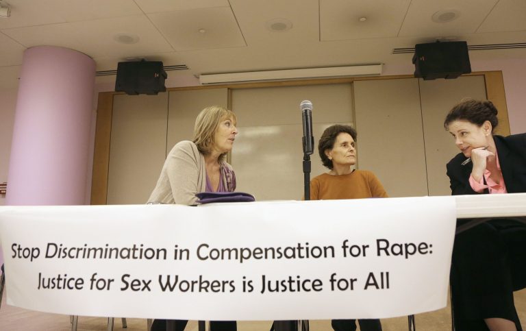 Maxine Doogan of the Erotic Service Providers Union, from left, Rachel West of the US PROStitutes Collective and Kimberly Horiuchi, spokesperson for the ACLU on victim compensation talk before a meeting with others who claim that the California Victims Compensation Board discriminates against sex workers by denying them benefits after having been raped in San Francisco. (AP/Jeff Chiu)