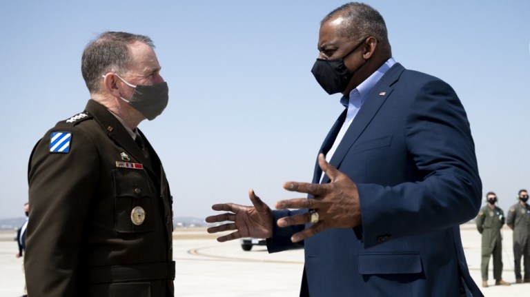 Secretary of Defense Lloyd J. Austin III meets with the commander of U.S Forces Korea, Army Gen. Robert B. Abrams, upon arrival at Osan Air Base, South Korea, March 17, 2021. 