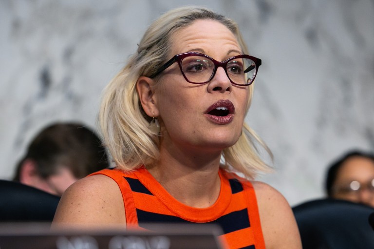 Subcommittee Ranking Member Kyrsten Sinema, D-AZ, right, accompanied by subcommittee Chairman Ted Cruz, R-TX left, looks on as Federal Aviation Administration Acting Administrator Daniel Elwell, National Transportation Safety Board Chairman Robert Sumwalt, and Department of Transportation Inspector General Calvin Scovel appear before a Senate Transportation subcommittee hearing on commercial airline safety, on Capitol Hill, Wednesday, March 27, 2019.