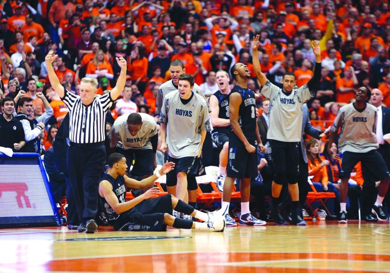 Nate Shron/Getty Images
Otto Porter, seated, made five 3-pointers on his way to a career-high 33 points as Georgetown beat Syracuse on Saturday.