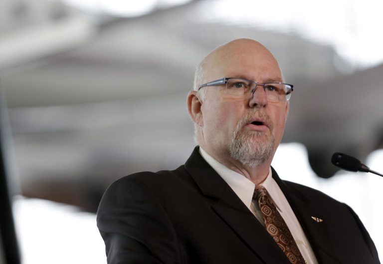 Outgoing machinists union president Tom Wroblewski speaks at a signing event for legislation to help keep production of Boeing's new 777X in Washington State, in Seattle on Nov. 11. (AP Photo/Elaine Thompson)