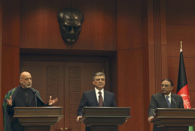   Afghan President Hamid Karzai, left, Turkish President Abdullah Gul, center, and Pakistan President Asif Ali Zardari speak to the media after their talks in Ankara, Turkey, Wednesday, Dec. 12, 2012. Zardari, Gul and Karzai attended the 7th Trilateral Summit of Afghanistan, Pakistan and Turkey.(AP Photo/Burhan Ozbilici)  