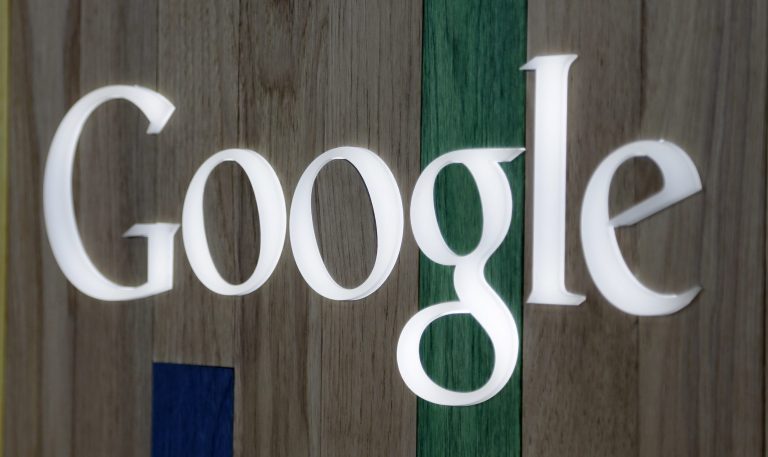 This April 9, 2014, photo shows the Google logo at a store in Hialeah, Florida. Google reports quarterly financial results after the market closed on Wednesday, April 16, 2014.