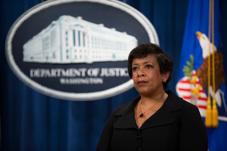 Attorney General Loretta Lynch officially accepted the FBI's recommendation that neither Hillary Clinton nor any of her aides should face criminal charges Wednesday. (AP Photo/Evan Vucci)