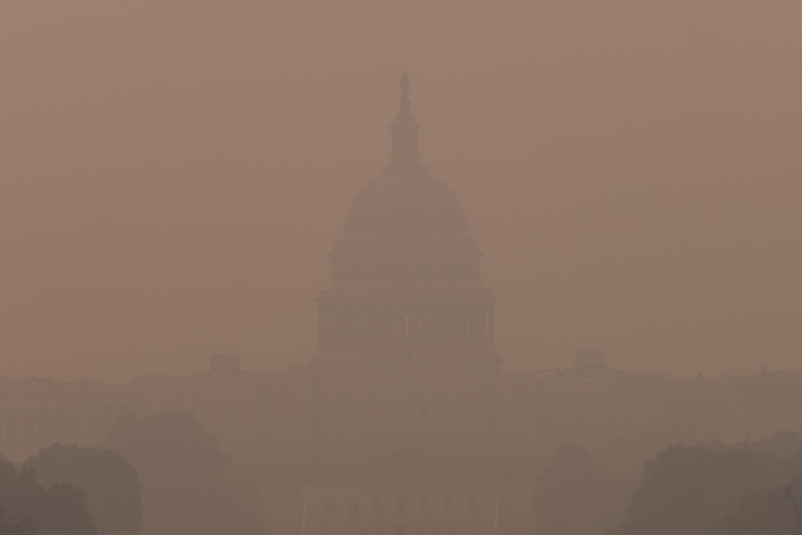 Smoke from wildfires in Canada enshrouds the U.S. Capitol, on Wednesday, June 8, 2023. The Air Quality Index reached Code Purple Wednesday morning as smoke continues to move south over the east coast of the United States. 