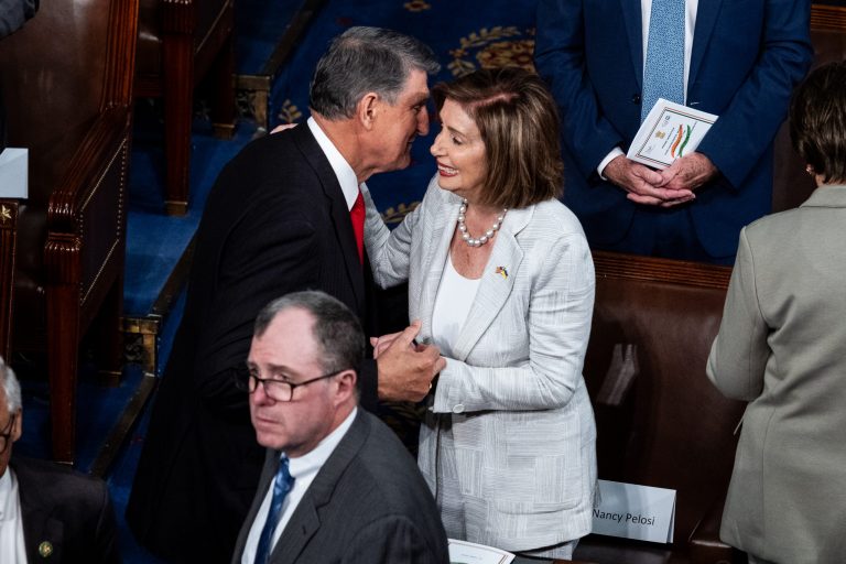 Sen. Joe Manchin, D-W.Va., and former House Speaker Nancy Pelosi arrive before India's Prime Minister Narendra Modi addresses a joint meeting of Congress at the Capitol in Washington, Thursday, June 22, 2023. 