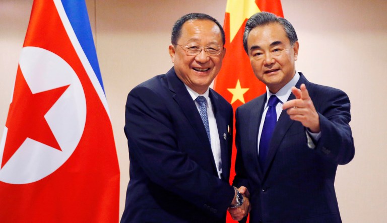 In this Aug. 6, 2017, file photo, North Korean Foreign Minister Ri Yong Ho, left, is greeted by his Chinese counterpart Wang Yi prior to their bilateral meeting in the sidelines of the 50th ASEAN Foreign Ministers' Meeting and its Dialogue Partners in suburban Pasay city, south Manila, Philippines. (AP Photo/Bullit Marquez, File)