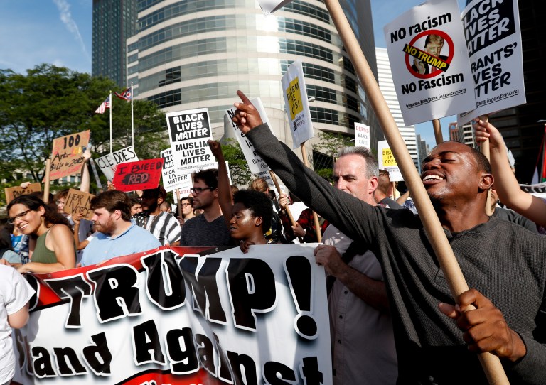 Pro-Trump counter-protesters met anti-Trump and Black Lives Matter protesters who were marching near the convention site and things got heated quickly. (AP Photo/Alex Brandon)