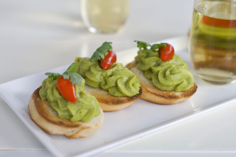   In this image taken on Monday, November 26, 2012, Christmas sangria and spring pea guacamole are shown in Concord, N.H. (AP Photo/Matthew Mead)  