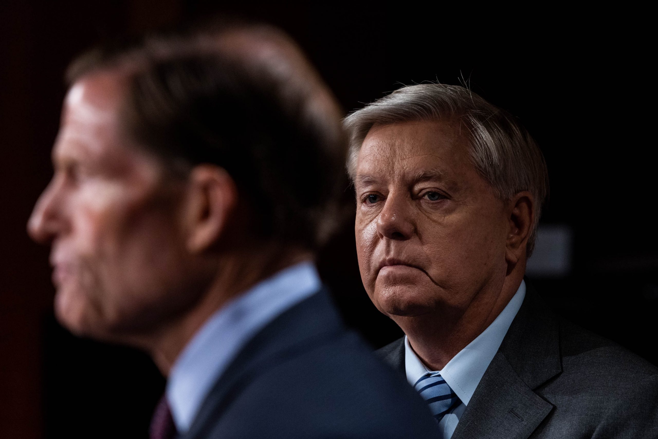 Sen. Lindsey Graham, R-SC, looks on as Sen. Richard Blumenthal, D-CT, speaks during a news conference on Capitol Hill, Sept. 29, 2022, to speak about "refusing Russian annexation of any portion of Ukraine."