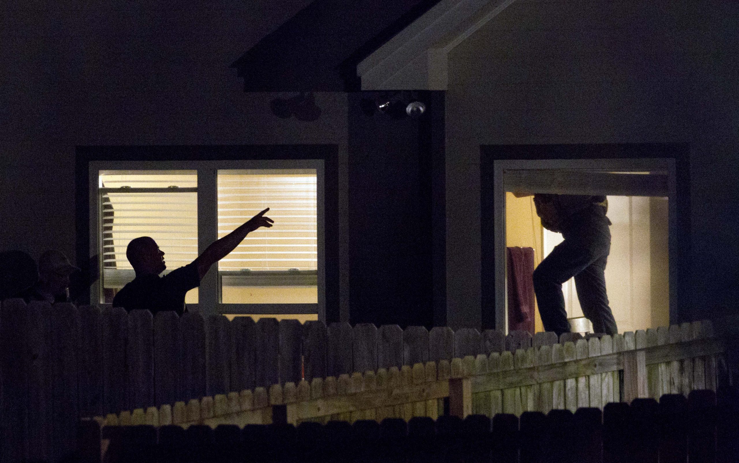 1 questioned during search for Auburn suspect