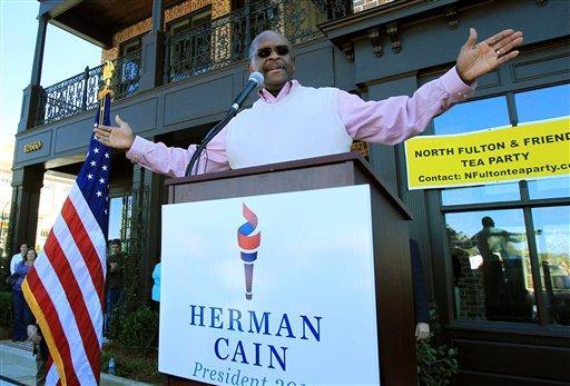 Campaign Roundup: Cain blames protesters
