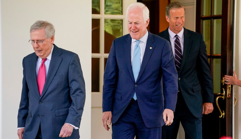 From left, Senate Majority Leader Mitch McConnell of Ky., Senate Majority Whip John Cornyn of Texas., and Sen. John Thune, R-S.D., leave the White House in Washington, Wednesday, July 19, 2017, to speak to members of the media following a luncheon with President Donald Trump and other GOP leadership. (AP Photo/Andrew Harnik)