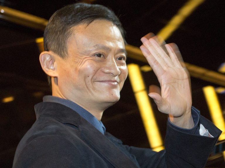 Jack Ma, Alibaba Executive Chairman waves to reporters before an IPO roadshow, at a hotel in Hong Kong, Monday, Sept. 15, 2014. Alibabaâs choice of New York over Hong Kong for its IPO, set for %%day, was a blow for the Chinese financial center. Now, the cityâs stock market is starting to rethink rules that stopped it a year ago from accommodating the Chinese e-commerce giantâs unique management structure.
(AP Photo/Vincent Yu)