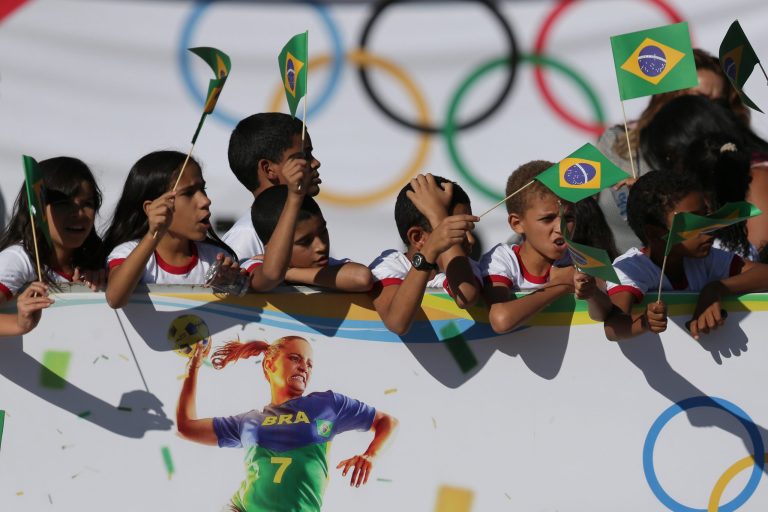 Travelers to the games could get virus and take it back to their countries, Canadian professor says. (AP Photo/Eraldo Peres)