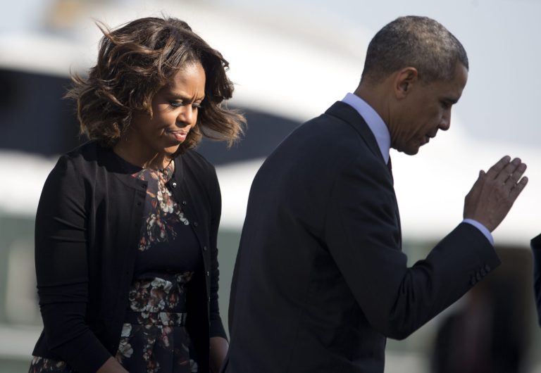 President Obama salutes as he and first lady Michelle Obama board Air Force One on Wednesday en route to Texas to attend a Fort Hood ceremony honoring those injured and killed there last week. (AP Photo/Carolyn Kaster)