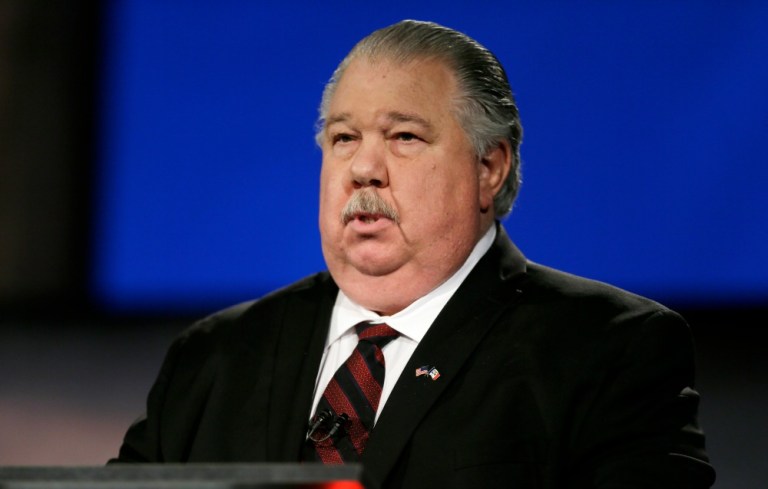 FILE - In this April 24, 2014 file photo, Sam Clovis speaks in Johnston, Iowa. Clovis, the Iowa chairman for Rick Perry's faltering Republican presidential bid says he is no longer part of the campaign as Perry seeks to keep his longshot effort alive on limited funds. (AP Photo/Charlie Neibergall, File)