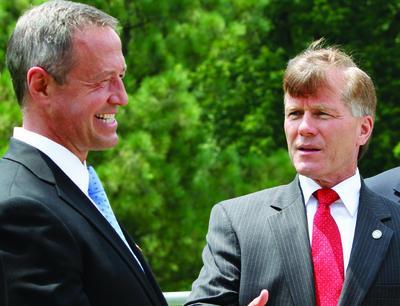 Virginia Gov. Bob McDonnell, second from left, gestures as he talks with Maryland Gov. Martin O'Malley.