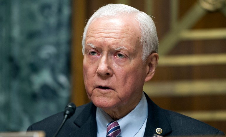 "It's a little difficult to me to understand why the president is jumping all over Jeff," said Sen. Orrin Hatch. (AP Photo/Cliff Owen)