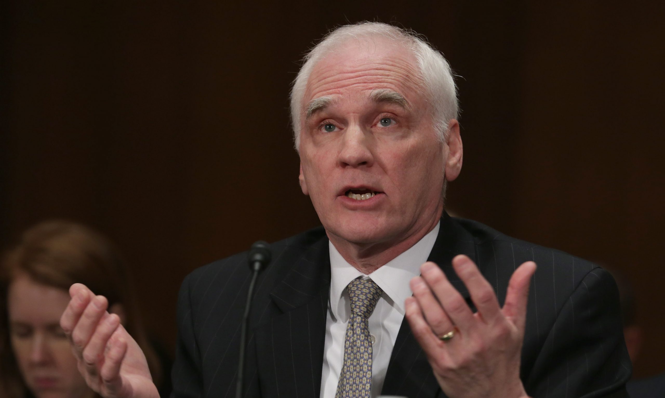 Top regulator calls for easing capital rules for small banks