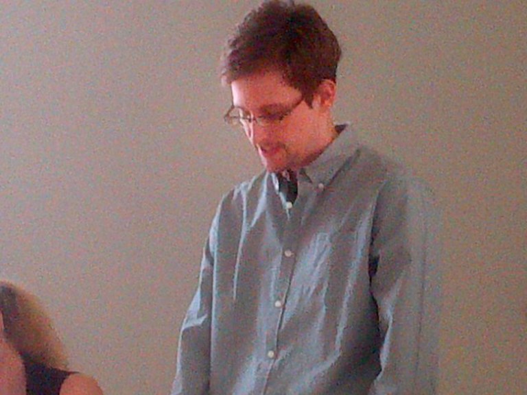 NSA leaker Edward Snowden looks down during a press conference at Moscow's Sheremetyevo Airport on July 12. (AP Photo/Human Rights Watch, Tanya Lokshina)