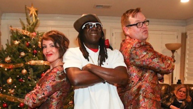 Flavor Flav with his hosts Ron and Sara Bonjean last December. (courtesy of Ron and Sara Bonjean).