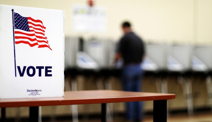 A group of Georgia voters and a Colorado-based watchdog organization filed a lawsuit late Monday asking a judge to overturn the results of last month's 6th Congressional District special election and scrap the state's voting system, Colorado Politics has learned. (AP Photo/David Goldman)