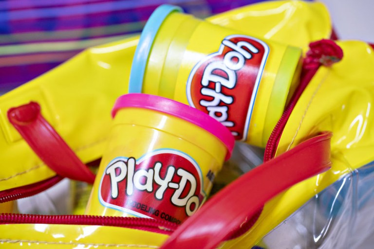 Hasbro Inc. Play-Doh brand modeling compound is arranged for a photograph in Tiskilwa, Illinois, U.S., on Saturday, July 21, 2018. The world's largest publicly traded toymaker's second-quarter revenue was $904.5 million, the companyÂ saidÂ Monday, surpassing analysts' projections. That drove the shares up as much as 13 percent, the biggest intraday gain since February 2017. 