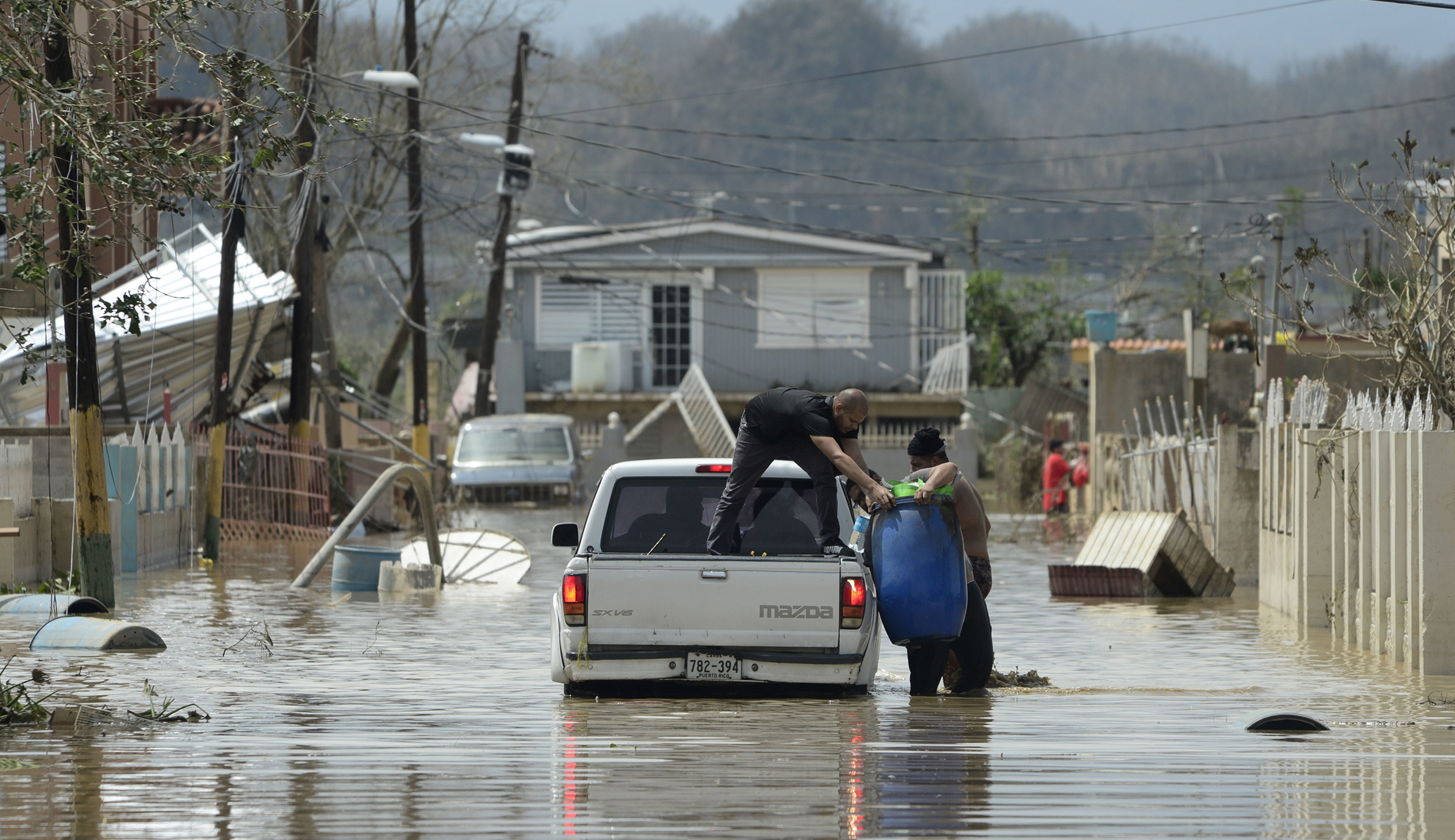 Thousands told to flee as hurricane-damaged dam in Puerto Rico threatens to burst