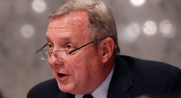 Each time you pay more to access your own money, you have this man to thank. (AP photo)