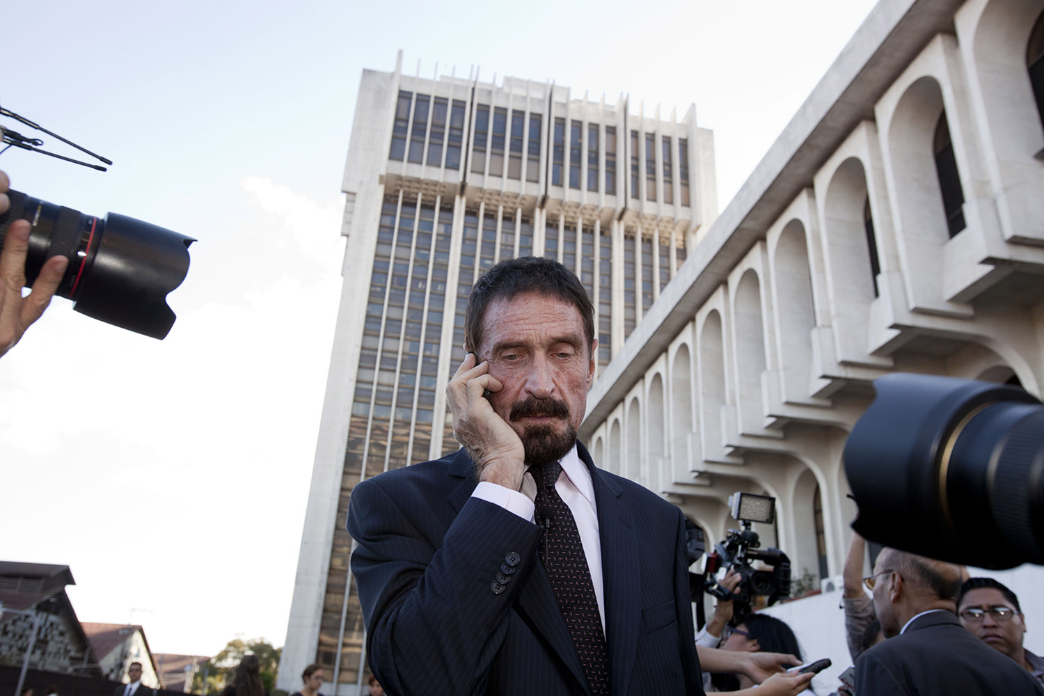 McAfee: Neighbor’s murder equipped him to battle government corruption in the U.S.