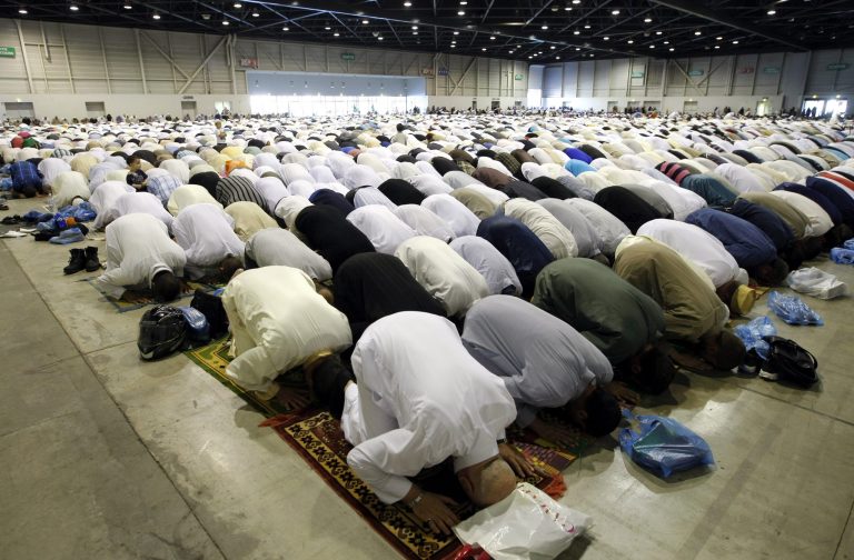 Muslims pray during the Eid al Fitr prayer marking the end of the Islam's holy fasting month of Ramadan at the Exhibition Center of the Parc Chanot, in Marseille, southern France, Monday, July 28, 2014. France has seen its Muslim population explode to more than 8 million, and it is growing, according to the Gatestone Institute. (AP Photo/Claude Paris)
