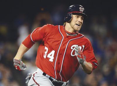 Harry How/Getty Images
Highly touted Nationals outfielder Bryce Harper will make his home debut Tuesday against the Diamondbacks.