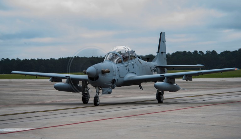 Chris Carlson, a Sierra Nevada Corporation senior pilot, taxis an A-29 Super Tucano on the flightline during its first arrival, Sept. 26, 2014, at Moody Air Force Base, Ga. The Afghan Air Force will implement the A-29 as their current air-to-ground aircraft, the Mi-35 attack helicopter, reaches its end of service life in January 2016.