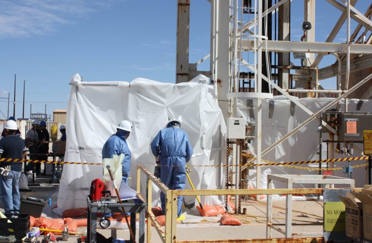 In this March 7, 2014 photo released the U.S. Department of Energy, specially-trained workers make unmanned tests inside a nuclear waste dump in Carlsbad, N.M. They are finalizing plans to enter the nation's only underground nuclear waste dump after two separate incidents forced its closure weeks ago, including a leak that exposed more than a dozen workers to low levels of radiation. Officials with the DOE's Waste Isolation Pilot Plant say initial testing shows there's no contamination at an air intake shaft that leads into the mine or at the bottom of the mine's salt shaft. (AP Photo/Department of Energy)