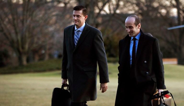 In this photo from Feb. 5, former White House staff secretary Rob Porter, left, walks with White House senior adviser Stephen Miller from Marine One across the South Lawn of the White House in Washington. (AP Photo/Manuel Balce Ceneta)