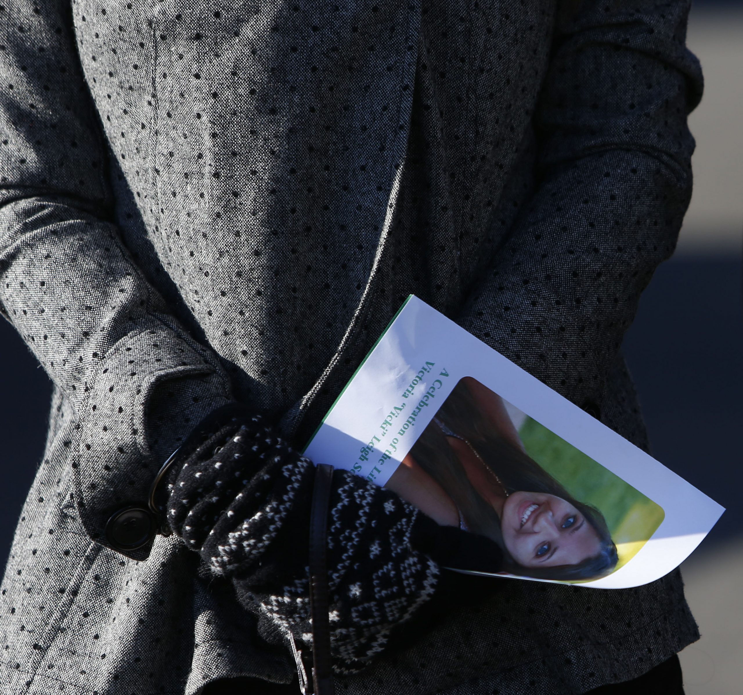 One by one, shattered Newtown buries its dead