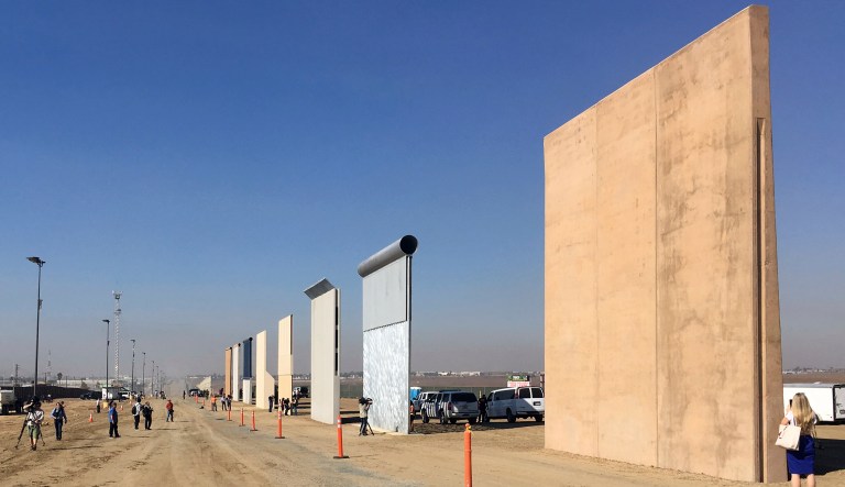 Only two wall prototypes built in Otay Mesa, Calif., last October would meet the president's standards, as the remaining structures are all made of solid concrete or steel with subterranean features that reach as far as eight feet below ground. (AP Photo/Elliott Spagat)