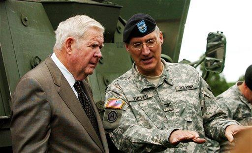 In this June 10, 2006 file photo, the late U.S. Rep Jack Murtha, D-Pa., left, and then-Col. Peter Fuller at Fort Indiantown Gap, Pa.(AP Photo/Bradley C. Bower, File) 