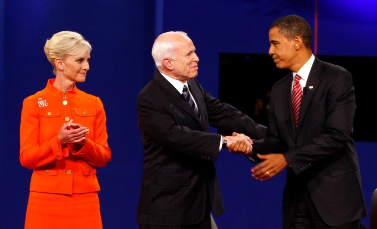 Republican presidential candidate Sen. John McCain, R-Ariz., accompanied by his wife Cindy, on stage with Democratic presidential candidate Sen. Barack Obama, D-Ill. after a presidential debate at Hofstra University in Hempstead, N.Y., Wednesday, Oct. 15, 2008. (AP Photo/Ron Edmonds)