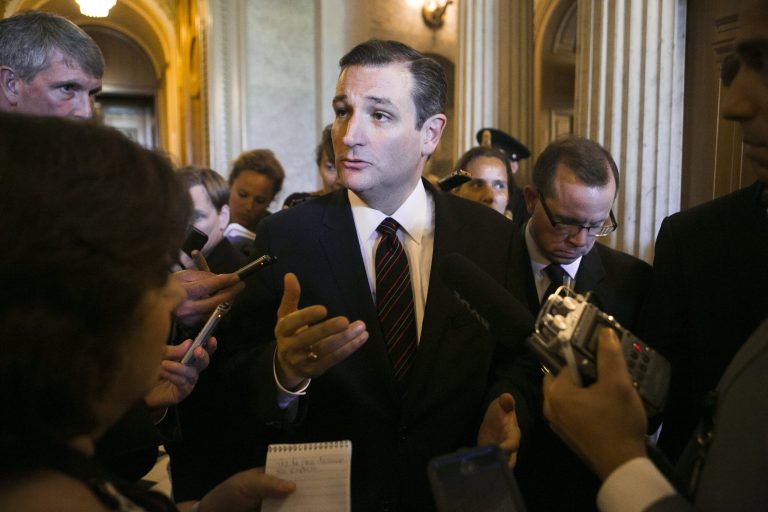 Senator Ted Cruz speaks with reporters on Capitol Hill, Sunday, July 26. 2015, after he tried unsuccessfully to force the Senate to consider an amendment to a transportation bill stating that sanctions on Iran could not be lifted until the country recognizes Israel's right to exist. Sen. Cruz was unable to rally enough senators to back his effort to get a roll call vote on the matter. (Graeme Jennings/Washington Examiner)