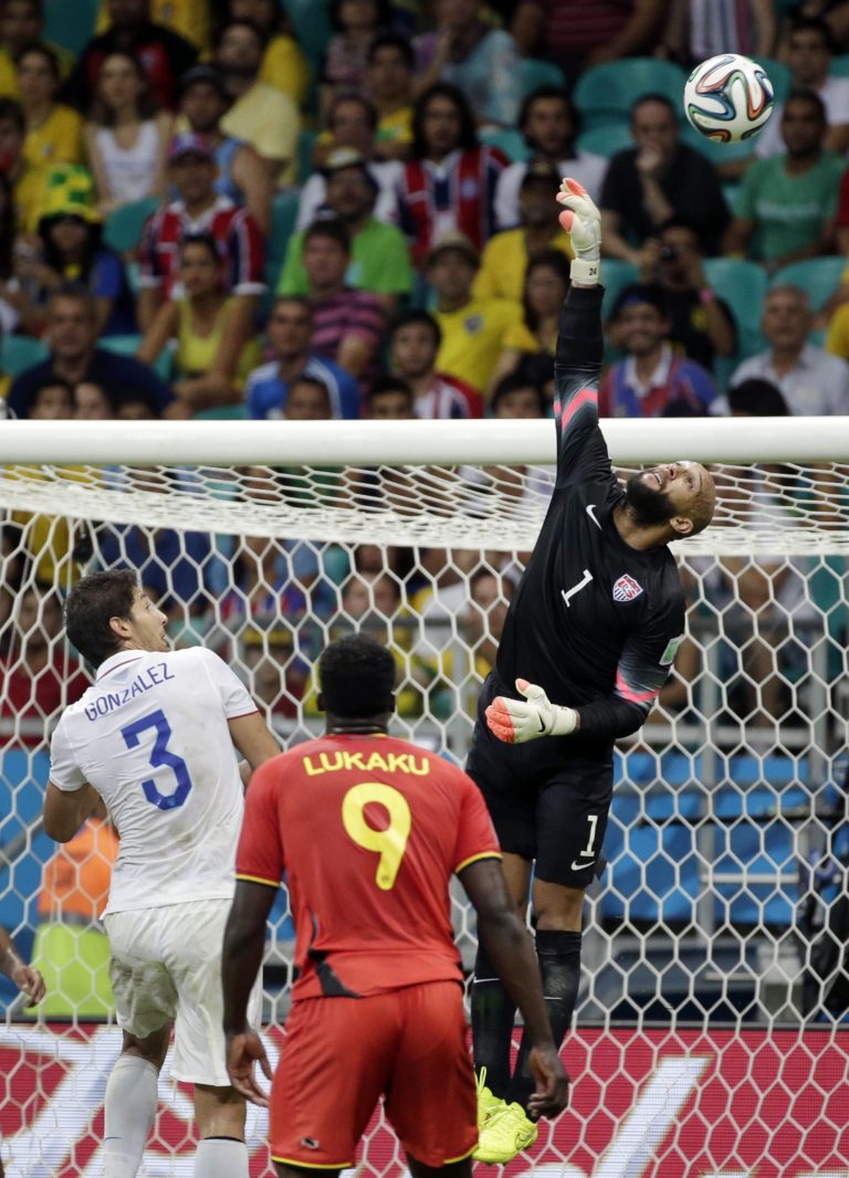 United States' goalkeeper Tim Howard (1) saves a shot during the World Cup round of 16 soccer match between Belgium and the USA at the Arena Fonte Nova in Salvador, Brazil, Tuesday, July 1, 2014. (AP Photo/Felipe Dana)