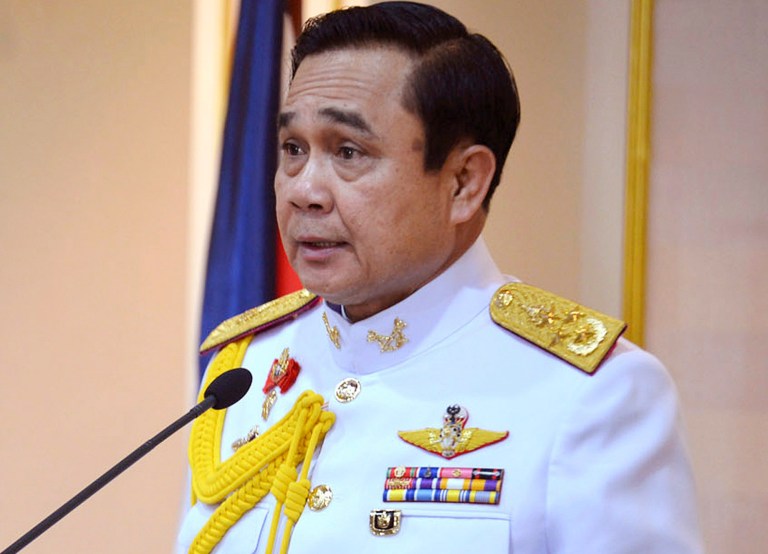 FILE - In Aug. 25, 2014 file this photo released by Thai Spokesman Office, Gen. Prayuth Chan-ocha speaks  after he accepted a written royal command issued by King Bhumibol Adulyadej certifying his appointment as the country's 29th premier in Bangkok in Bangkok, Thailand.  The general who transitioned from Thailand's junta leader to prime minister has awarded top posts in his Cabinet to senior military officials, in the latest move that critics say will prolong the military's grip on power. Gen. Prayuth Chan-ocha's government lineup was announced Sunday, Aug. 31, 2014. . (AP Photo/Thai Spokesman Office, File)