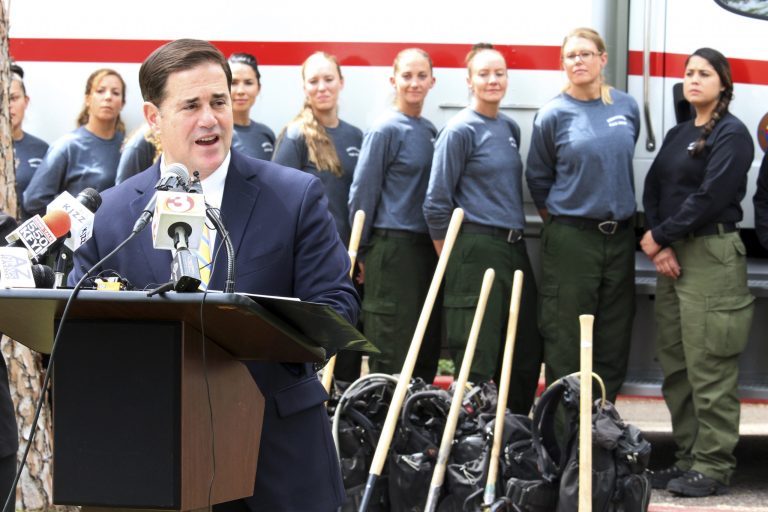 Arizona Gov. Doug Ducey talks about the upcoming wildfire season at the Capitol in Phoenix, Ariz., on April 11. The $1.5 million joint initiative between Arizona's Department of Corrections and Department of Forestry and Fire Management is a passion project of the state's first-term Republican governor. (AP Photo)