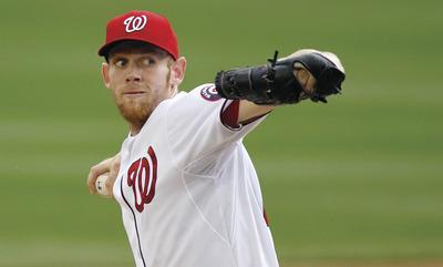 Haraz N. Ghanbari/AP
Washington Nationals starting pitcher Stephen Strasburg allowed four runs in four innings vs. the Padres on Tuesday.