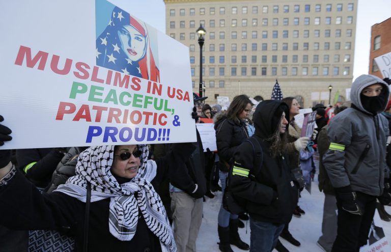 The Justice Department will ask for an emergency stay to honor President Trump's executive action on immigration admissions, the White House's Office of the Press Secretary said in a statement late Friday. (AP Photo/Tony Dejak)