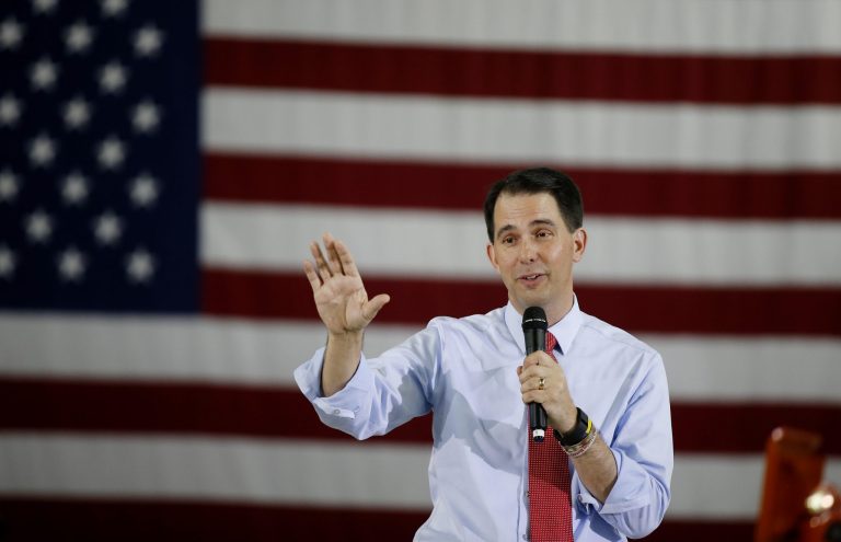 Republican presidential candidate Wisconsin Gov. Scott Walker speaks during a town hall meeting Monday, in Las Vegas. (AP Photo/Isaac Brekken)